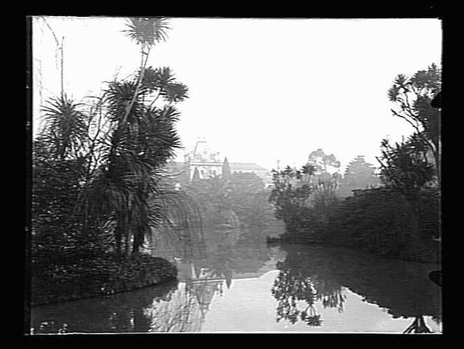 Lake surrounded by gardens.