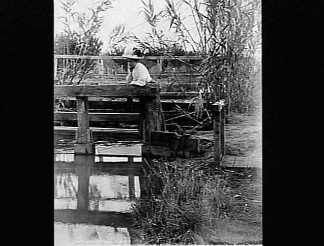 MERRIGUM - WOMAN POSED BY CHANNEL