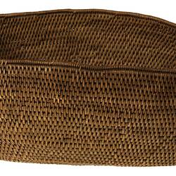 Side view of woven container.