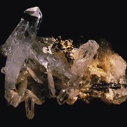 Clear quartz prisms with gold.