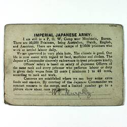 Printed postcard with signature at bottom