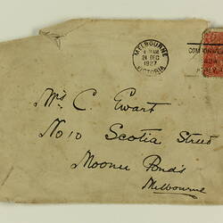 Front of envelope with handwriting and stamp.
