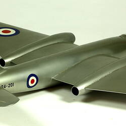 Silver model aeroplane. Three quarter back right view.