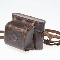 Dark tan leather camera carry case with strap.