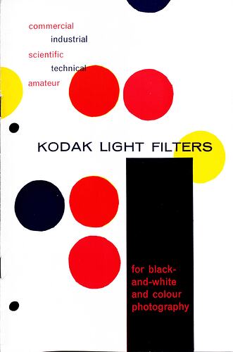 Cover page with white background and red, black and yellow dots.
