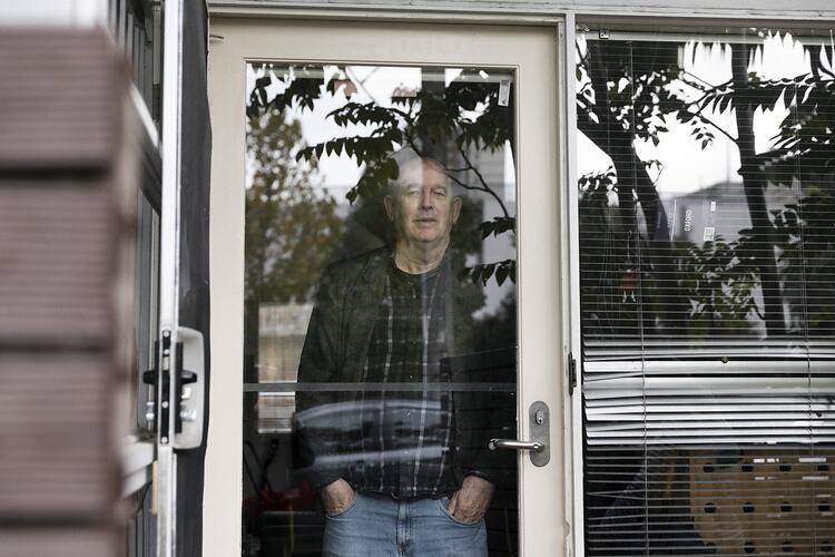 Public Housing Resident Phil [Last Name Withheld] Stands Behind his Front Door during the COVID-19 Pandemic, Richmond, Victoria, 7 May 202