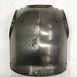 Back of metal breastplate.