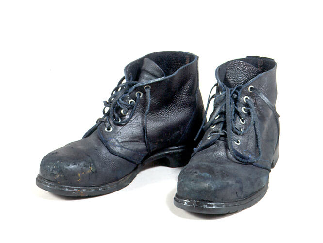 Pair of black lace up safety boots.