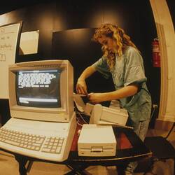 Digital Photograph - Student printing work, Sunrise Classroom, Melbourne Museum, Russell Street, 1989