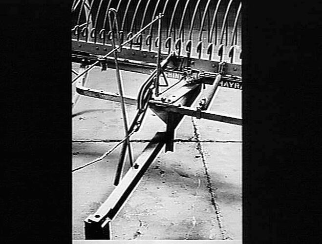 DUMP RAKE WITH TRACTOR HITCH. DEC 1954