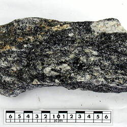 Mineral sample with scale bar.