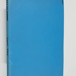 Back cover of blue folder. Black writing along spine.