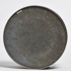 Base of round metal cake tin.