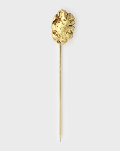 Stick pin with small gold nugget at top.