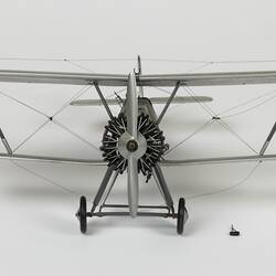 Model of silver aeroplane. Front view.