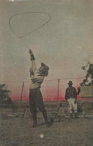 Digital Photograph - Holden Brothers Circus, Man in 'Cowboy' Hat Spinning a Lasso in a Paddock, circa 1910