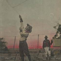 Digital Photograph - Holden Brothers Circus, Man in 'Cowboy' Hat Spinning a Lasso in a Paddock, circa 1910