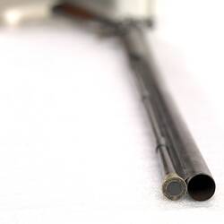 Detail of barrel of single barrelled shotgun.