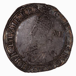 Coin, round, Crowned bust of the King facing left wearing a ruff and armour; text around.