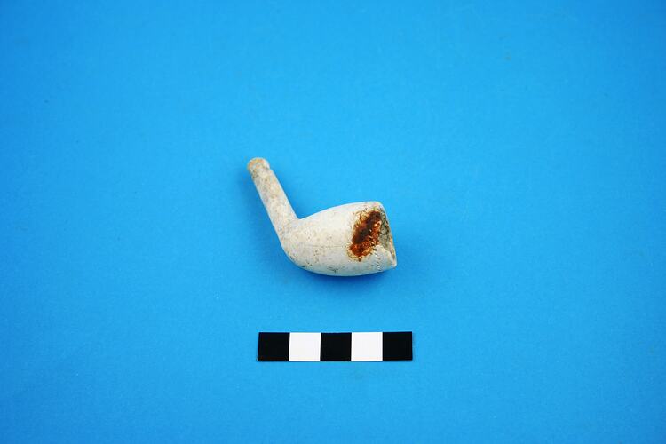 One bowl, partial stem of clay pipe.