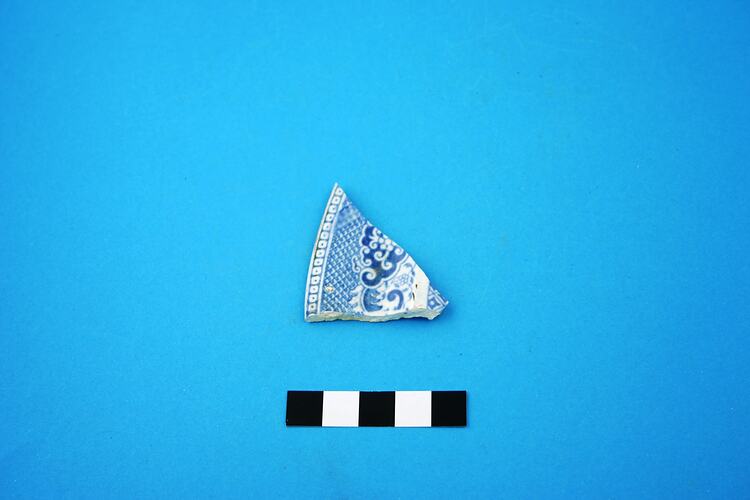 Fragment of earthware plate rim.