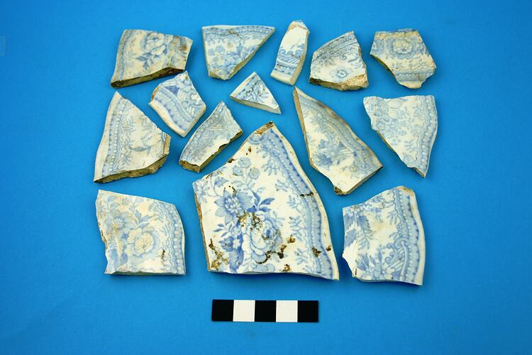 Fourteen earthenware plate rim fragments.