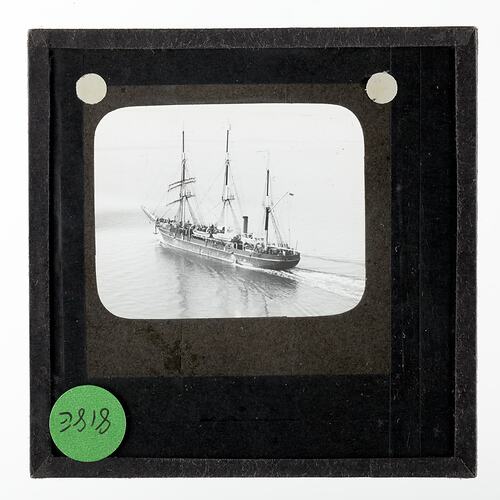 Lantern Slide - An Aerial View of the Discovery Steaming Along in Open Water, BANZARE Voyage 2, Antarctica, 1930-1931