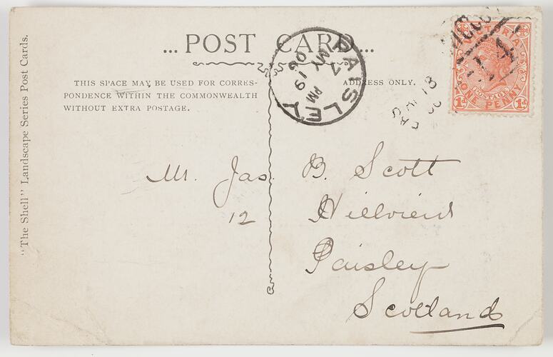 Reverse of postcard with address and stamps.