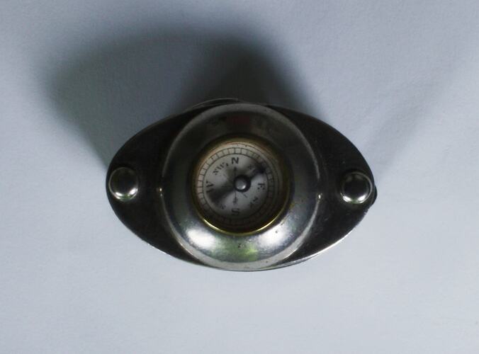 Metal compass.