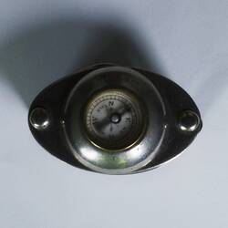 Metal compass.