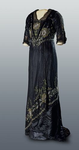 Black, silk satin dress, beading, floral embroidery.