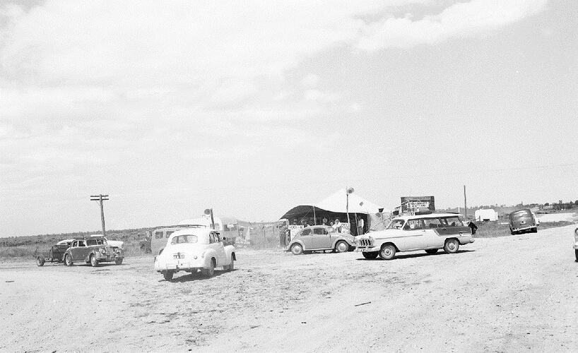 Monochrome photograph of a fishing competition.