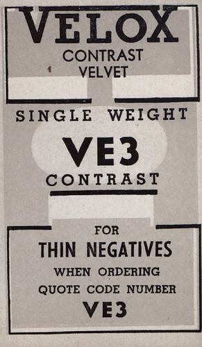 Grey paper label with printed black text.