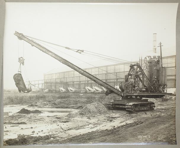 Monochrome photograph of a dragline excavator.