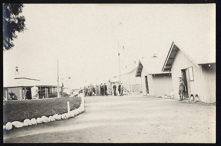 Monochrome photograph of a military camp.