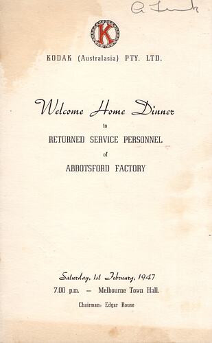 Cardboard cover page with printed text and stains.