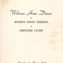 Cardboard cover page with printed text and stains.