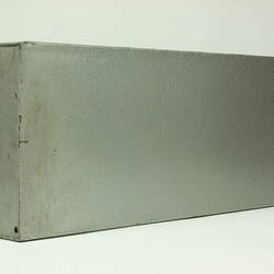 Side of rectangular metal box.