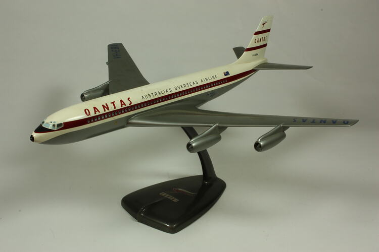 White and silve QANTAS model aeroplane.