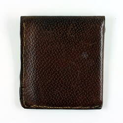 Back of brown leather wallet.