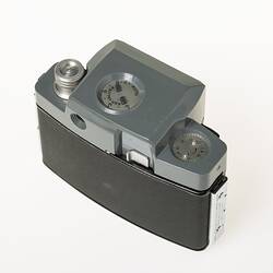 Black, grey and silver, metal and plastic 35mm camera. Top view.