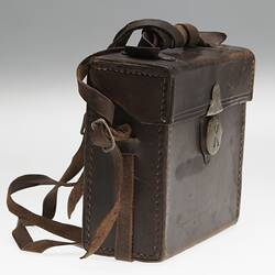 Brown leather carry bag with shoulder strap.