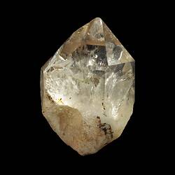 Pointed crystal, clear at top, cloudy at base.