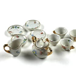 Tiny tea set, side view.
