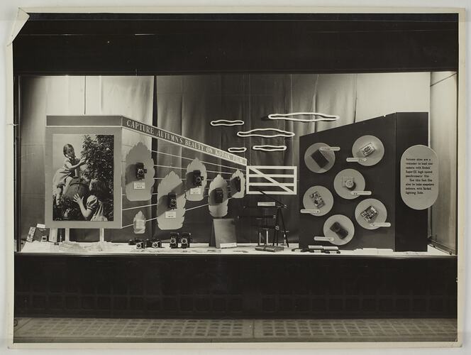 Kodak shopfront display with products, photographs and signage arranged within.