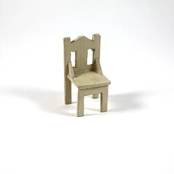 Cream painted wooden chair.
