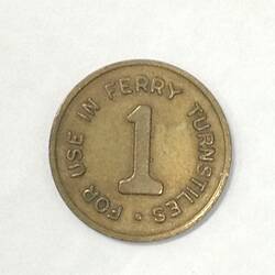 Round ferry transport token.