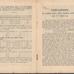 Open booklet with off-white pages and black printed text.
