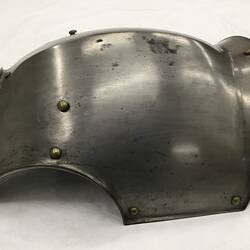 Profile of metal breastplate.