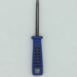 Metal chisel with blue plastic handle.